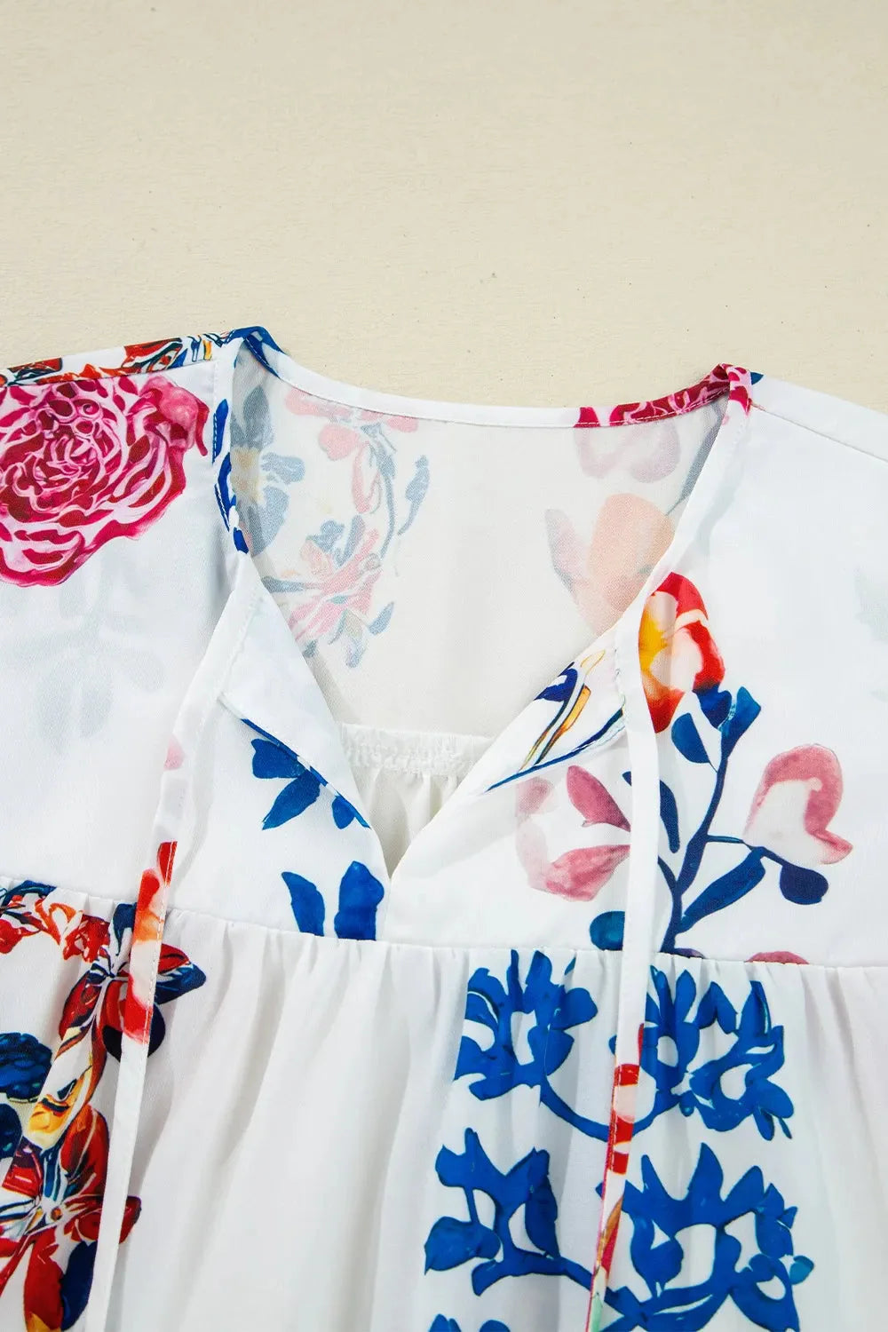 Bloom Printed 3/4 Sleeve Tie Neck Tassel Boho Blouse