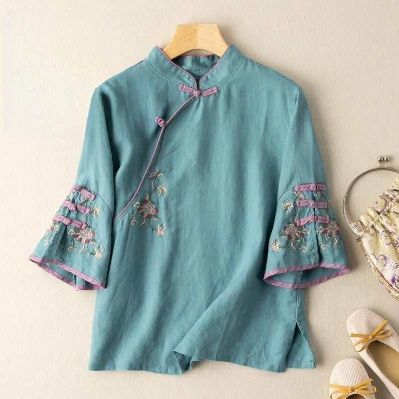 Sure! How about "Chic Embroidered Mandarin Collar Cotton and Linen Tea Dress"?