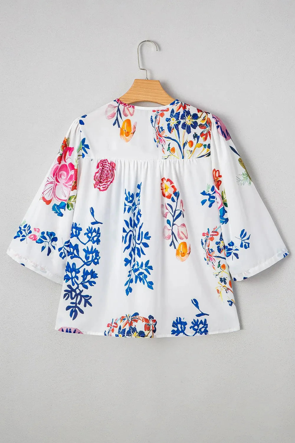 Bloom Printed 3/4 Sleeve Tie Neck Tassel Boho Blouse