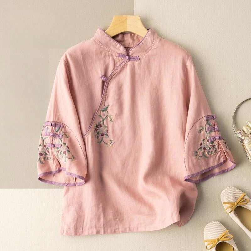 Sure! How about "Chic Embroidered Mandarin Collar Cotton and Linen Tea Dress"?