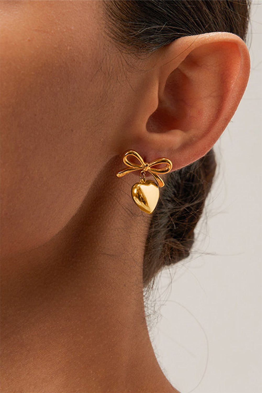 Gold Heart and Bow Studded Earrings