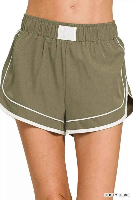 Dusty Olive Soft Woven Lined Dolphin Shorts by Zenana