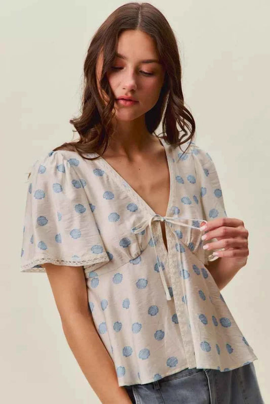 Ivory Shell Print Tie Front Flutter Sleeves Blouse by SO ME