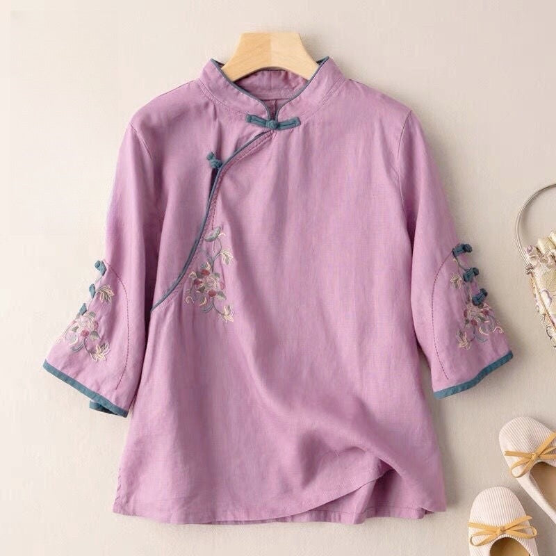 Sure! How about "Chic Embroidered Mandarin Collar Cotton and Linen Tea Dress"?