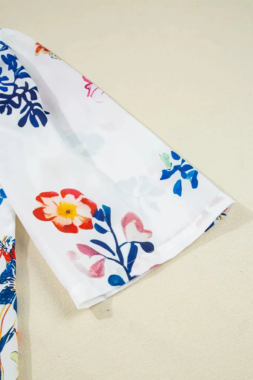 Bloom Printed 3/4 Sleeve Tie Neck Tassel Boho Blouse