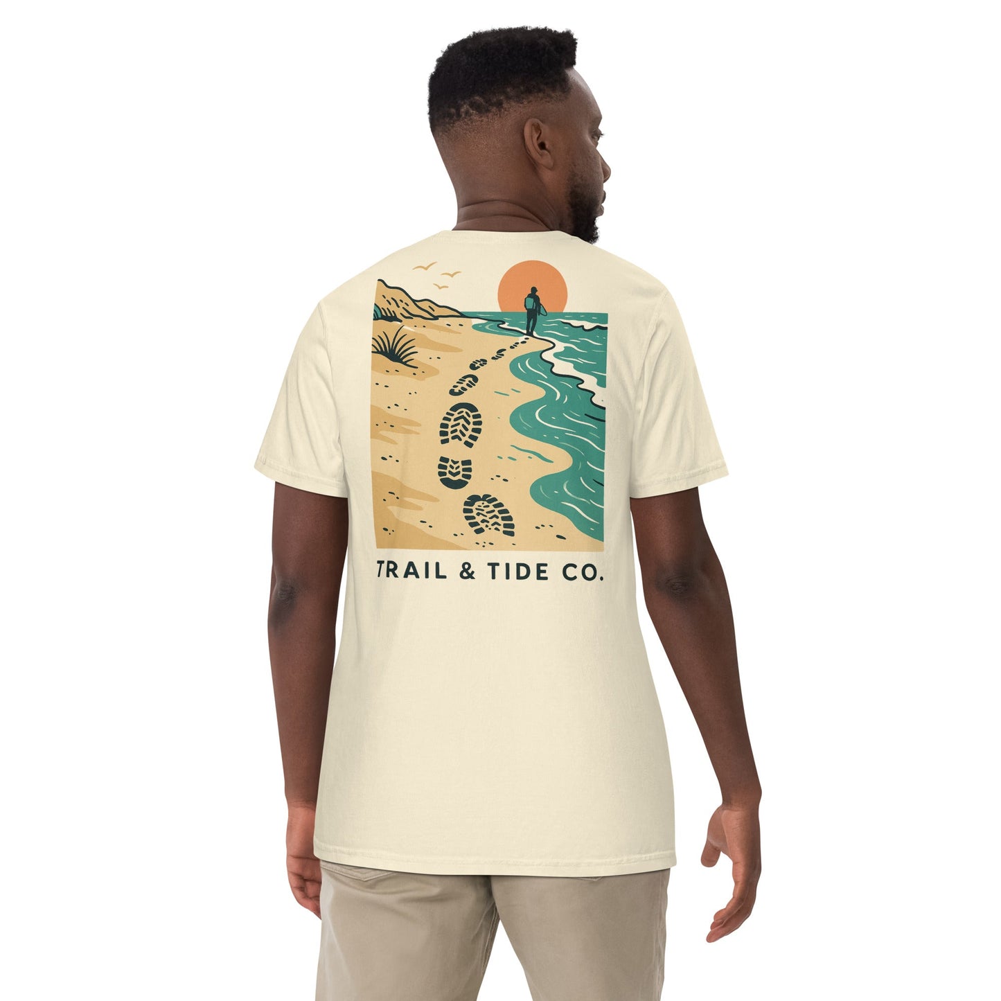 Tidewalker Tee | Bootprints Along Coastal Trail with Sunset and Ocean – Beach Walk Graphic Back Tee with Front Crest Patch (CC1717)