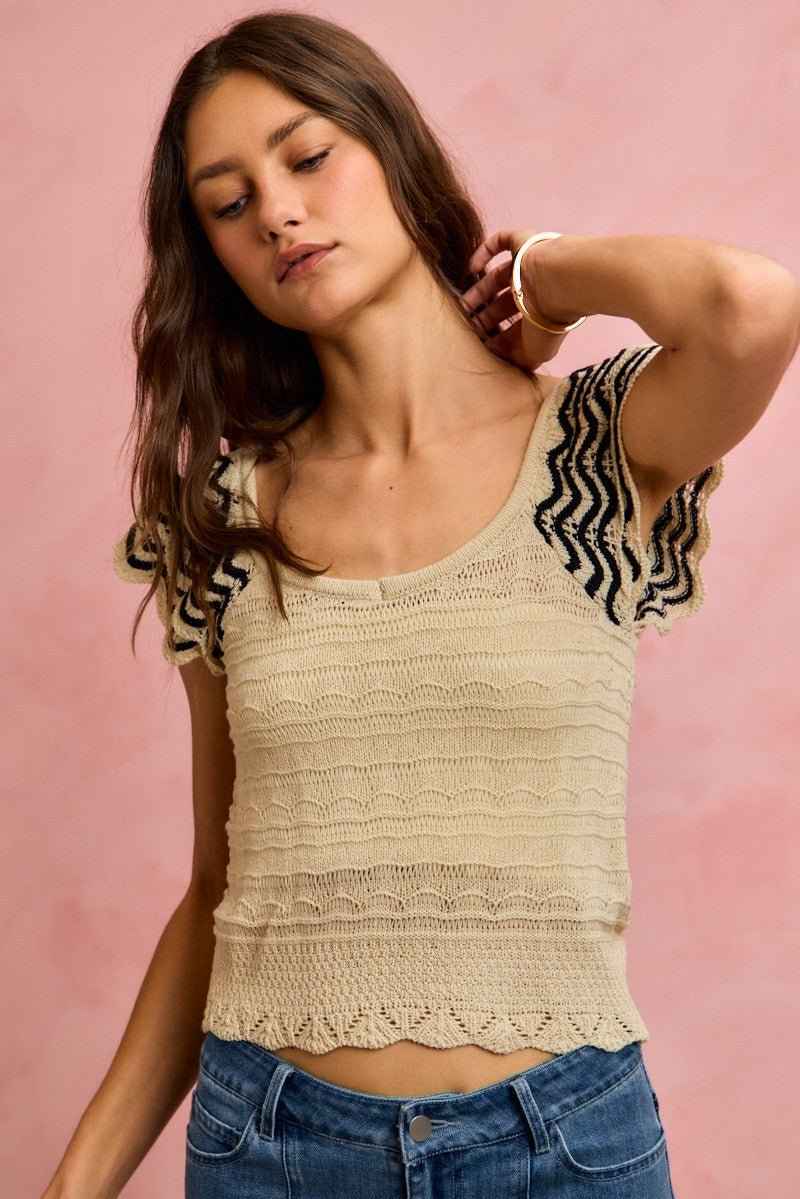 Oatmeal Wavy Textured Knit Top with Fluttered Sleeves by So Me