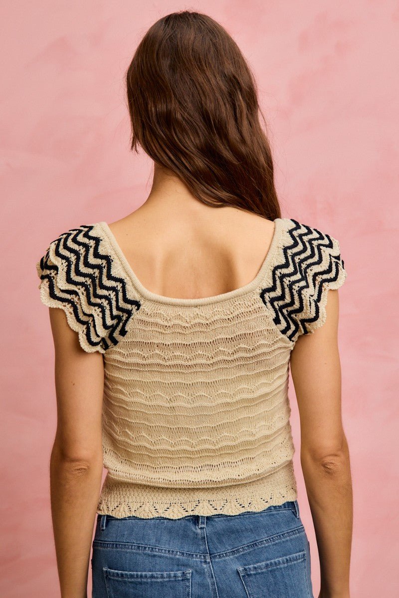 Oatmeal Wavy Textured Knit Top with Fluttered Sleeves by So Me
